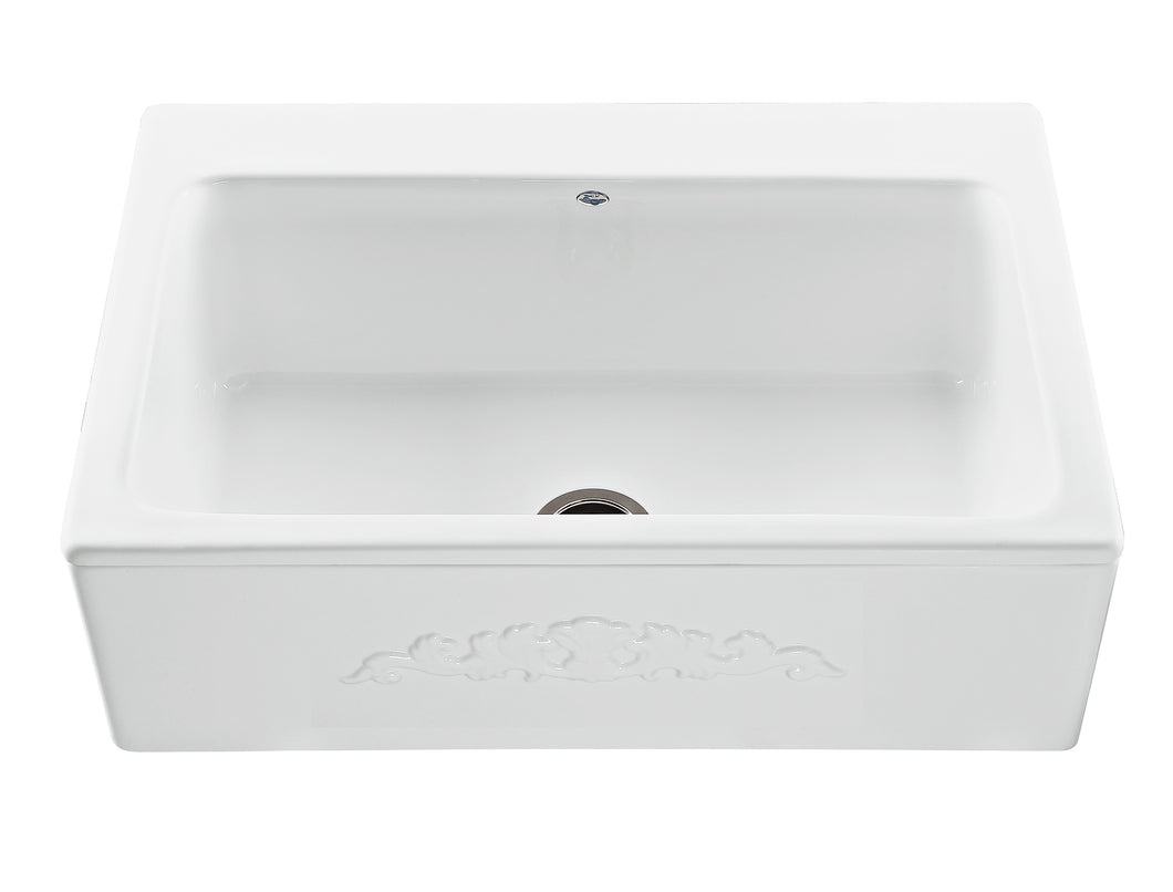 The McCoy farmhouse style kitchen sink features a single bowl with a center drain and front sink apron with an embossed design detail. - The Tubfair